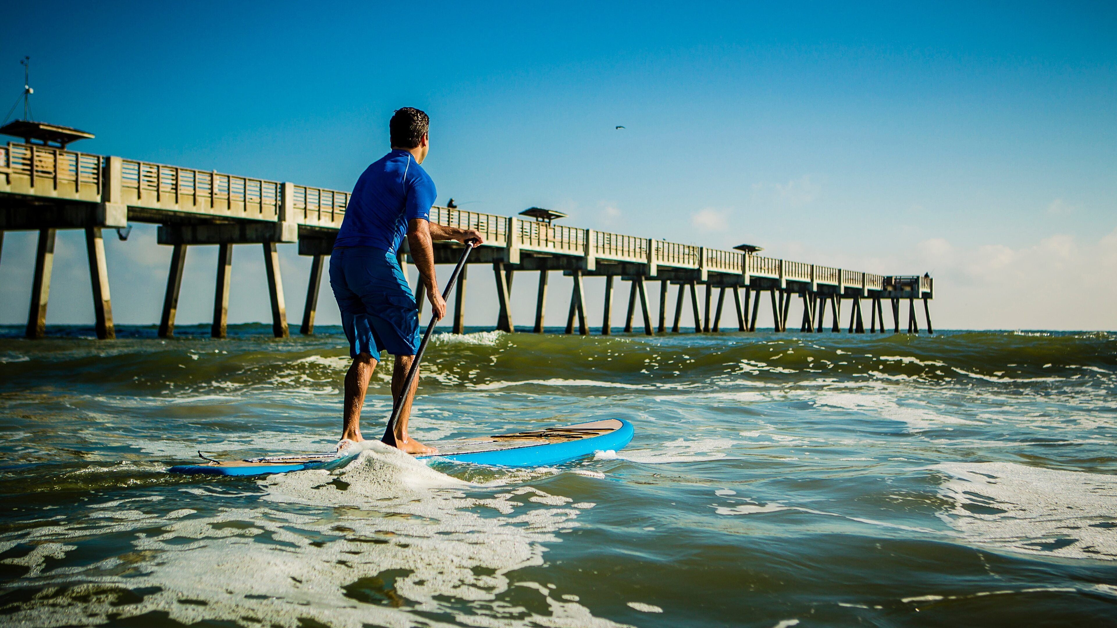 Jacksonville featuring general coastal views and kayaking or canoeing as well as an individual male