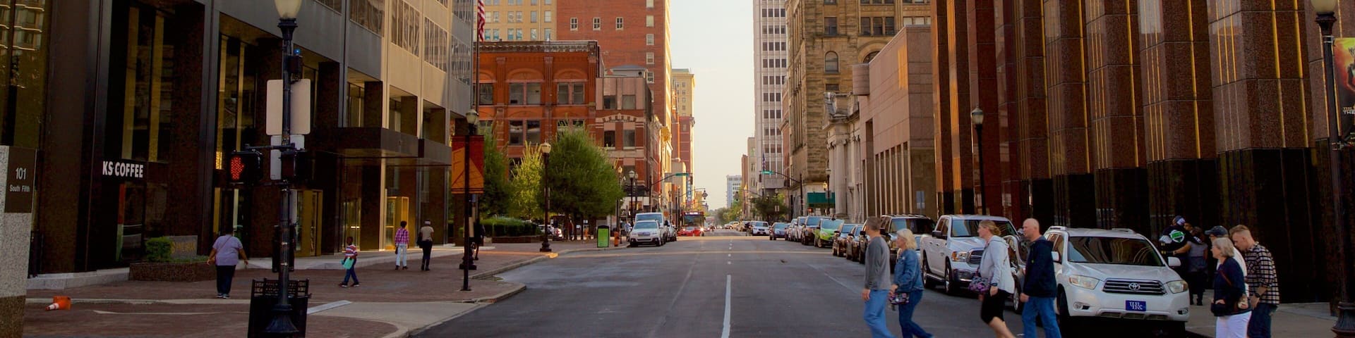 Louisville which includes street scenes and a city as well as a small group of people