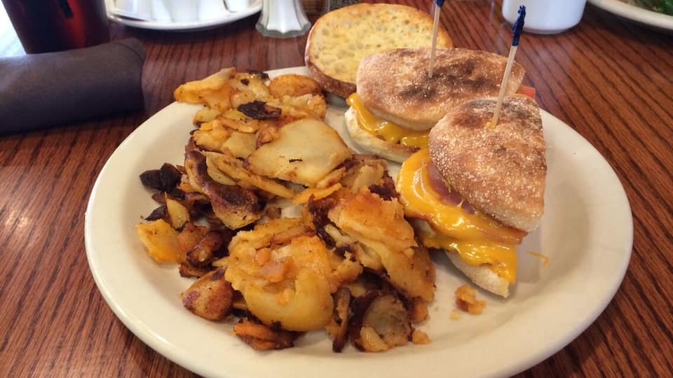 Hip breakfast spot full of bizarre paintings, Motown music and comfort food breakfast platters that are mouthwatering delicious. Matt's Morning Slider with cafe potatoes is heaven in your mouth. #Delicious