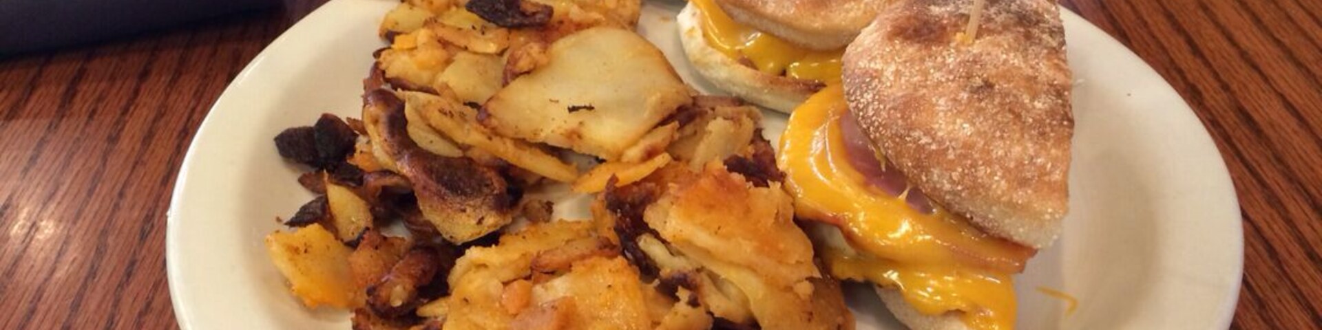 Hip breakfast spot full of bizarre paintings, Motown music and comfort food breakfast platters that are mouthwatering delicious. Matt's Morning Slider with cafe potatoes is heaven in your mouth. #Delicious