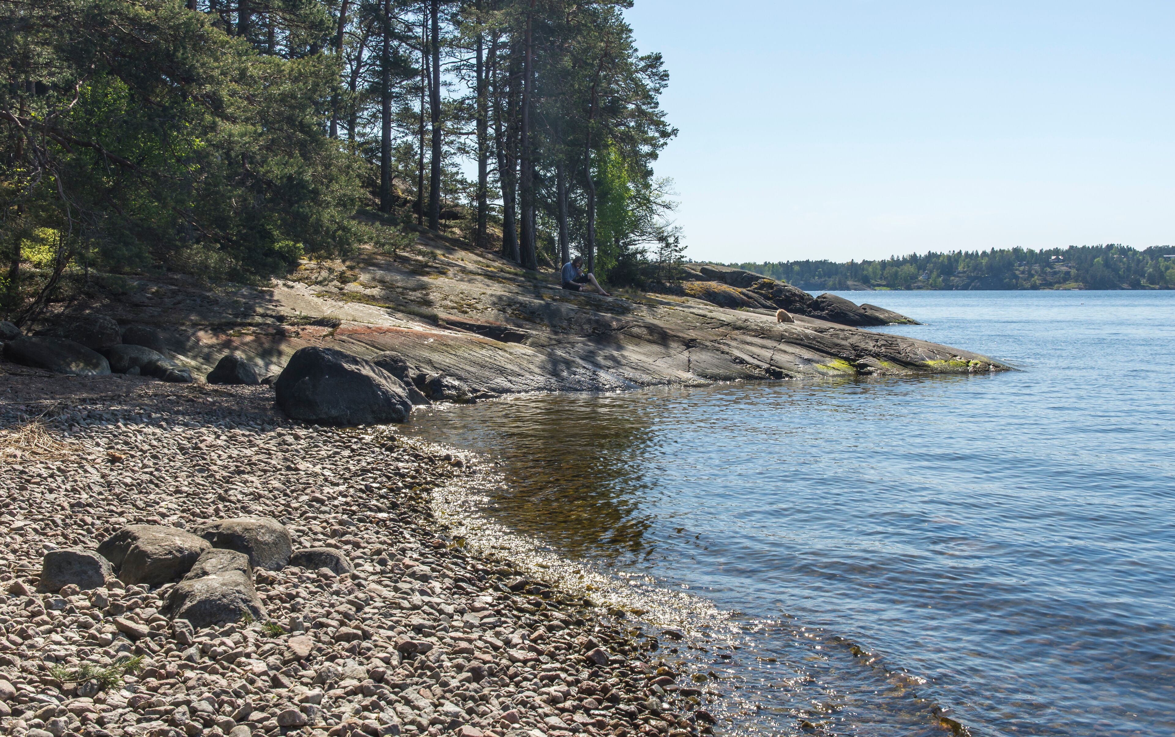 Beaches and cliffs in a secluded cove on Värmdö Sweden for sun and swimming in the summer
