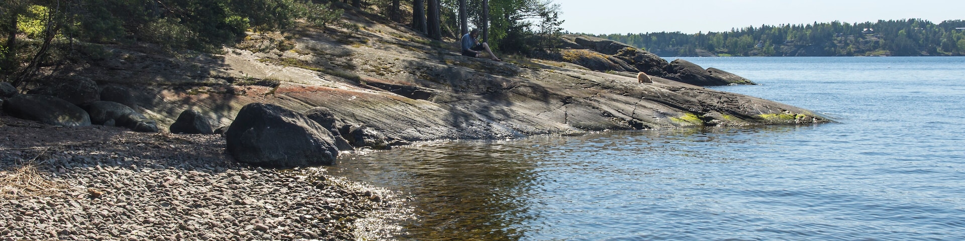 Beaches and cliffs in a secluded cove on Värmdö Sweden for sun and swimming in the summer