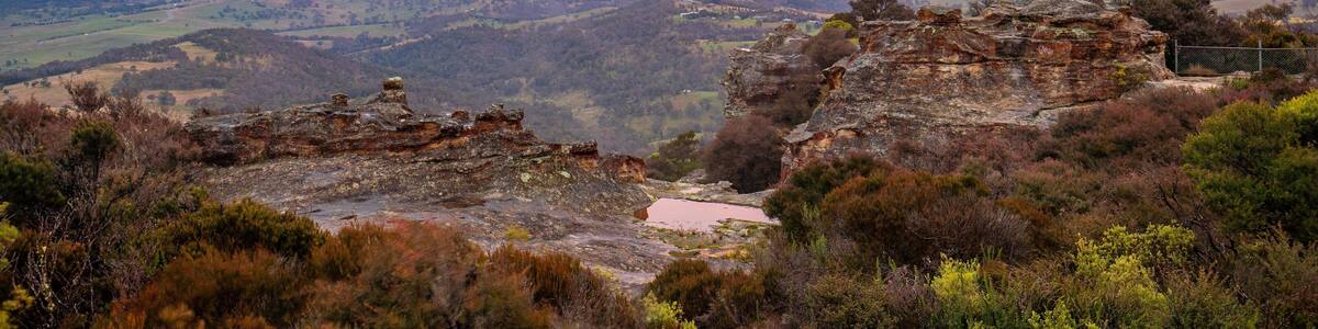 Lithgow featuring a gorge or canyon, a sunset and landscape views