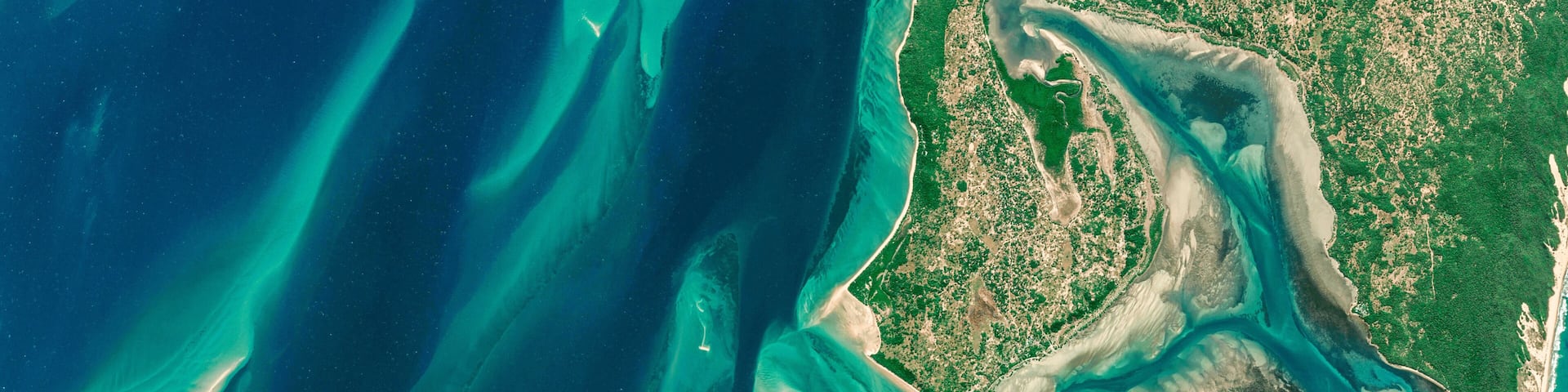 Satellite view of the coast of Mozambique aerial view of Inhaca Island, Mozambique, ocean and pristine islands. Africa. Element of this image is furnished by Nasa