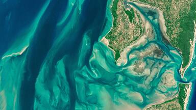 Satellite view of the coast of Mozambique aerial view of Inhaca Island, Mozambique, ocean and pristine islands. Africa. Element of this image is furnished by Nasa