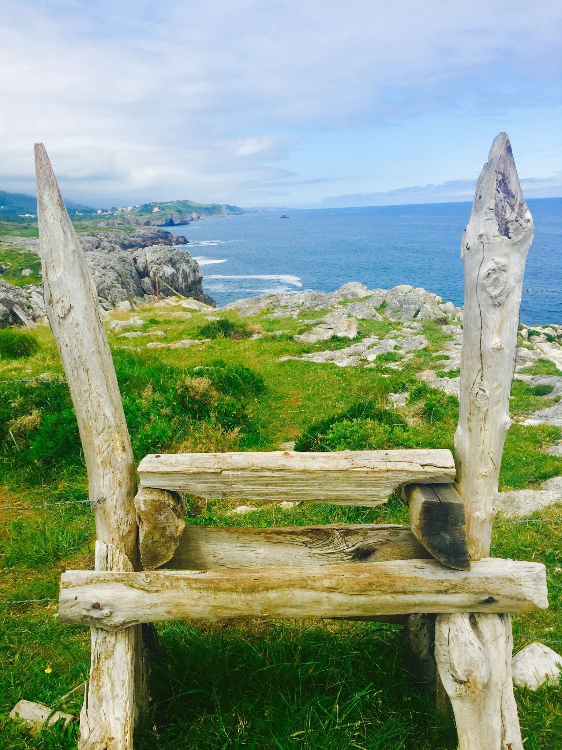 A rustic cattle guard along the cliffs above the Cantabrian Sea