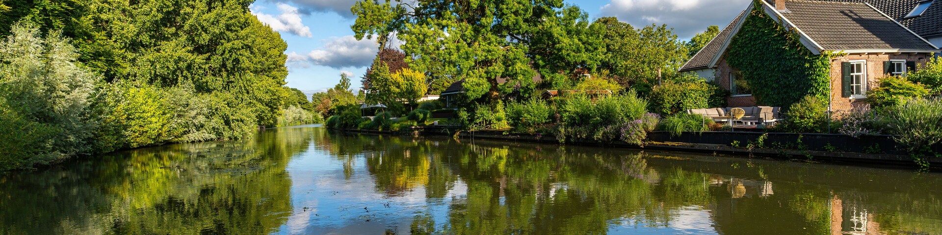 Scenic view of river Kromme Rijn in Bunnik on a sunny summer day