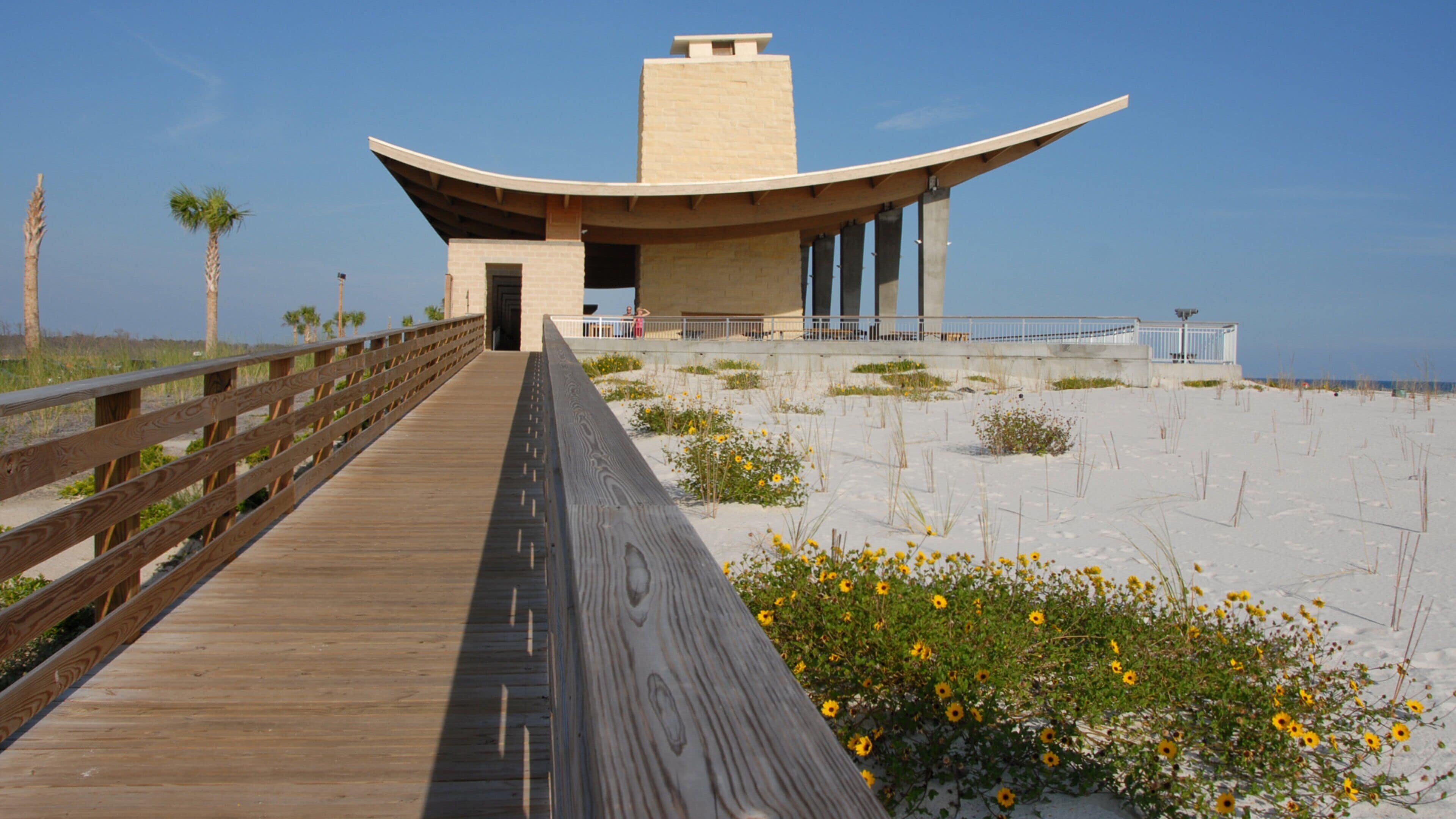 Gulf Shores featuring a sandy beach, general coastal views and modern architecture