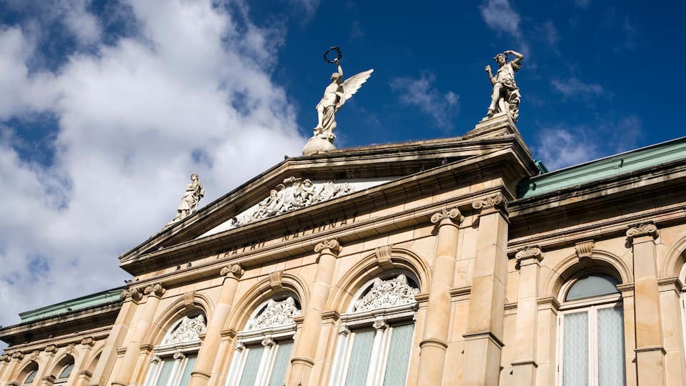 AT3YDJ Costa Rica San Jose Plaza de la Cultura Teatro Nacional National Theatre exterior statuary above portico