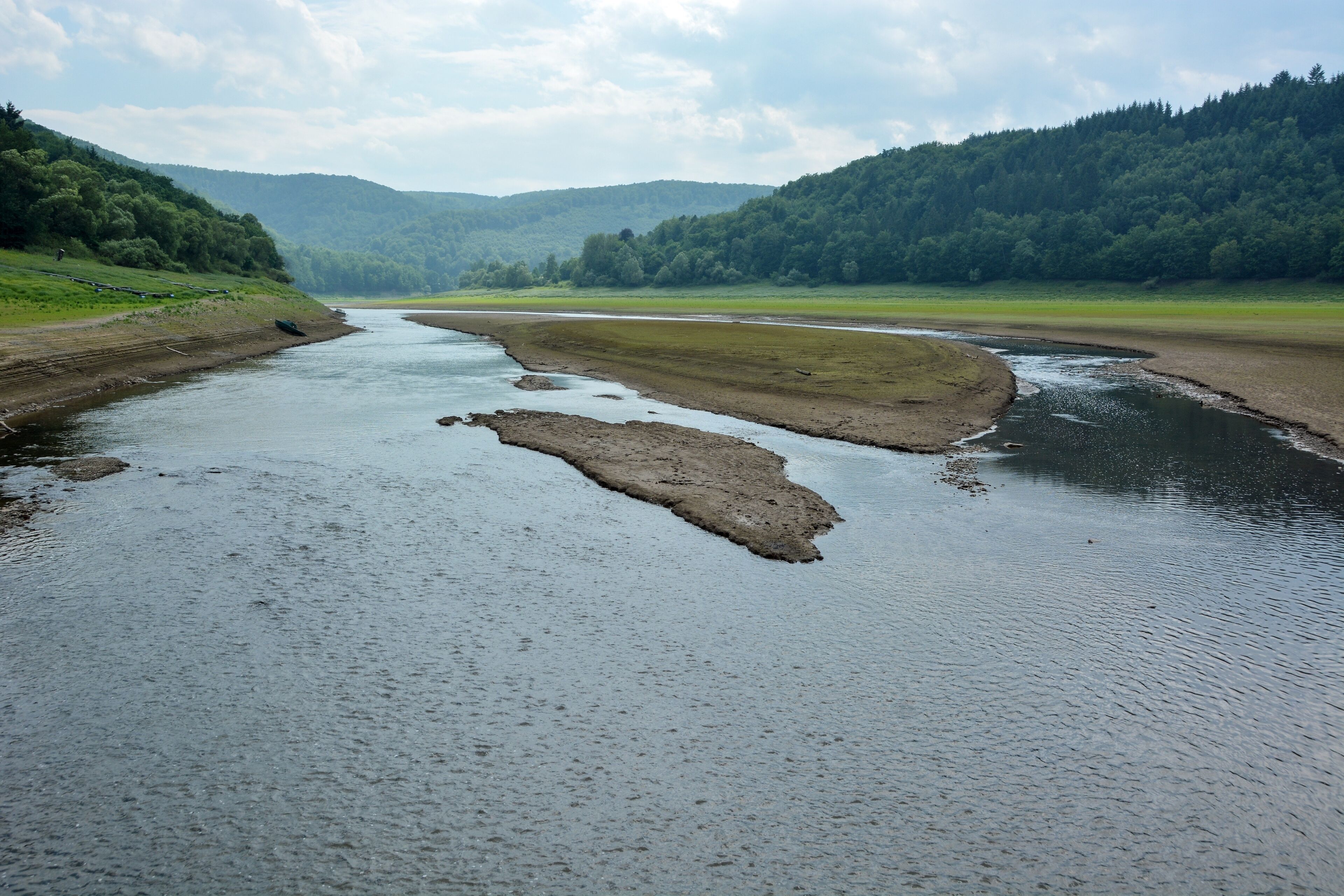 View from Bridge of Asel, inside Eder Lake, in Summer at low water level, onto the river Eder.