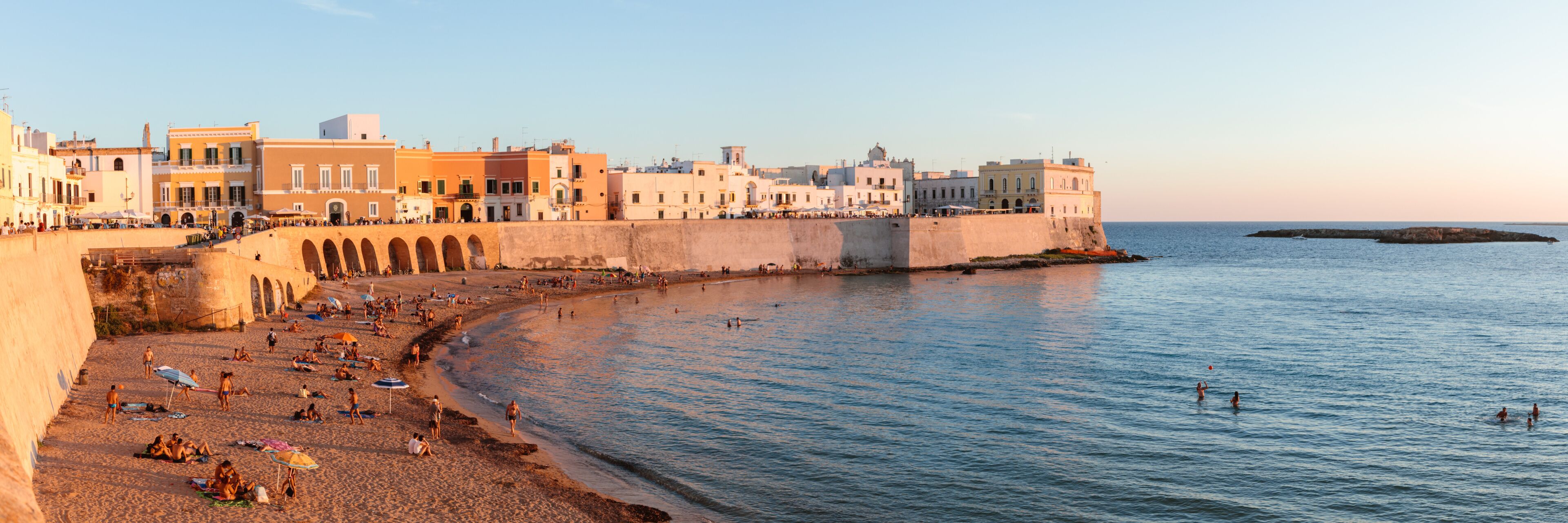 Panoramic of beach at sunset, Gallipoli, Salento, Apulia, Italy