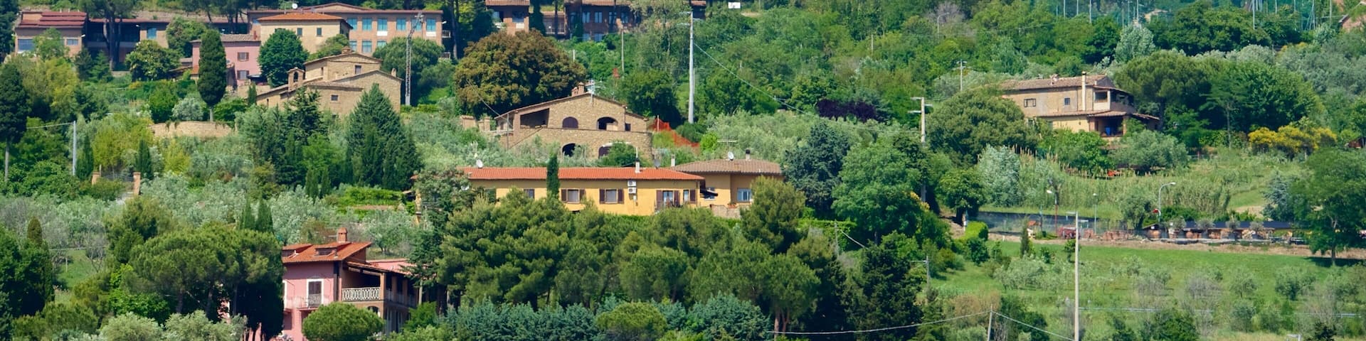 Volterra som viser kulturarvsgenstande og en lille by eller en landsby