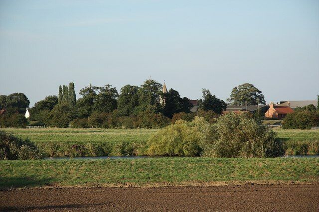 View to Holme. View from St.Wilfrid's church at North Muskham across the River Trent to Holme, with the spire of St.Giles' church 590811 just visible in the trees. According to the 18th century Nottinghamshire antiquary Thoroton, Holme and North Muskham were on the same bank of the Trent until the River changed course during a catastrophic flood in the 16th century.