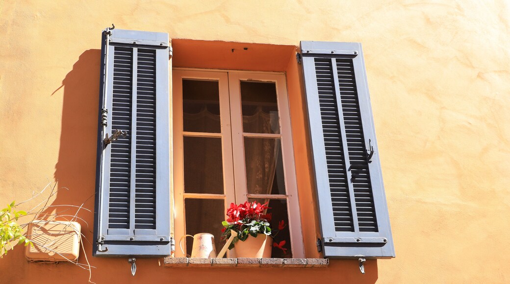 A close up window in the medieval village Mouans-Sartoux near french riviera - France