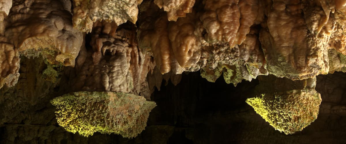 A cave with stalactites and stalagmites.