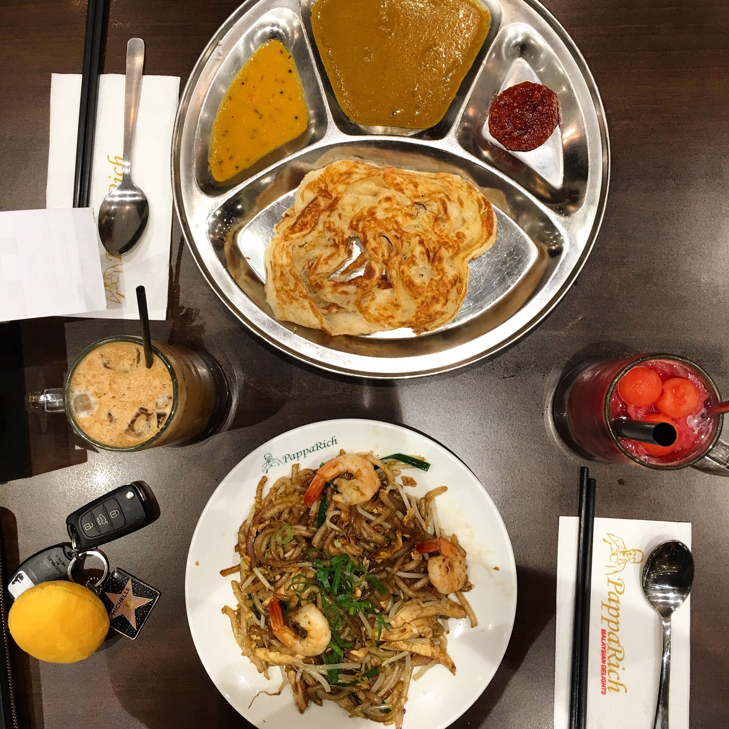 Malaysian food at papa rich. 

Always busy. Their noodles are the best 