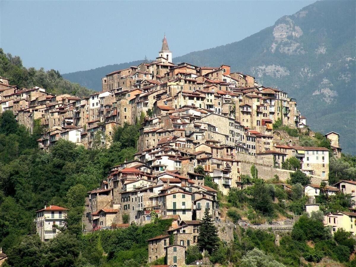 This is a medieval Village in Apricale that is a hidden gem. It's only a few kilometers from the coast (Riviera). About 30 minutes from the French border of Cote d'Azur, Monte Carlo and Nice
It was named "The most beautiful Village of Italy" It offers numerous opportunities for tourism and pleasure spots.. 
The entire Village, has small nooks and crannies, narrow streets and stone walls. You feel like you stay in a castle. You will be transformed into another time and place. This is an unforgettable experience with great historical value and has a magical atmosphere.