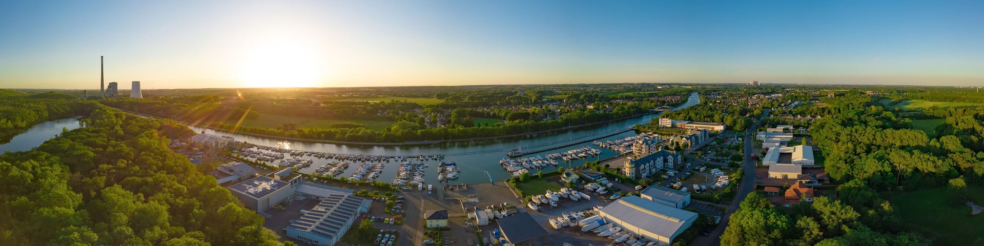 Panoramic sunset drone landscapes over the small yacht port in Luenen in Germany