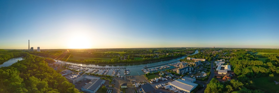 Panoramic sunset drone landscapes over the small yacht port in Luenen in Germany
