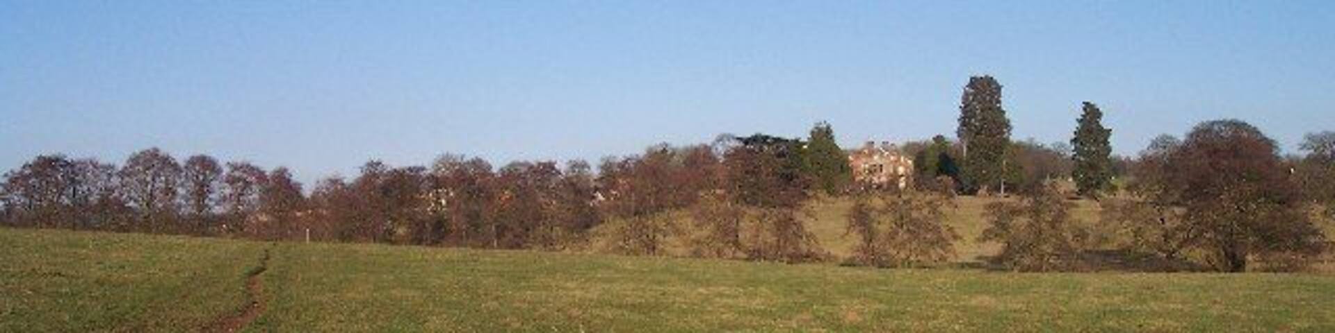 Buckenhill Manor. Viewed from the south west along the bridleway from the manor to Hainsford.