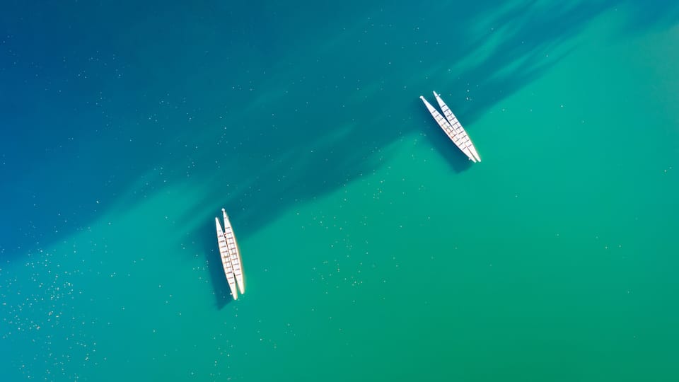 Minimalist scene with a couple of kayaks seen from above on Parsippany lake, NJ.