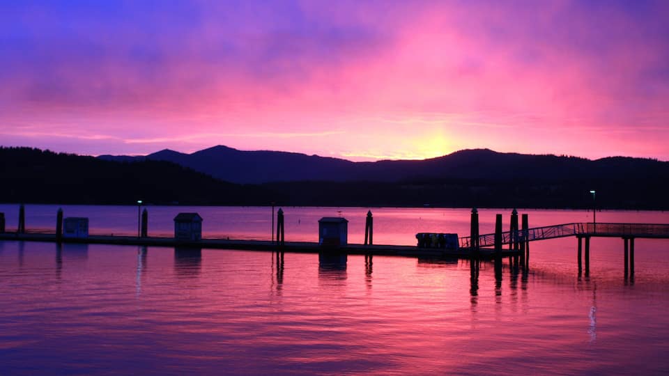 Coeur d\'Alene which includes a sunset and a lake or waterhole