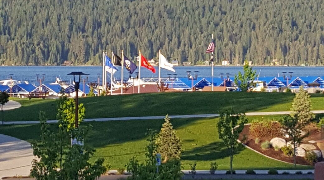 Beautiful spring day in CDA of the military flags flying in the park.