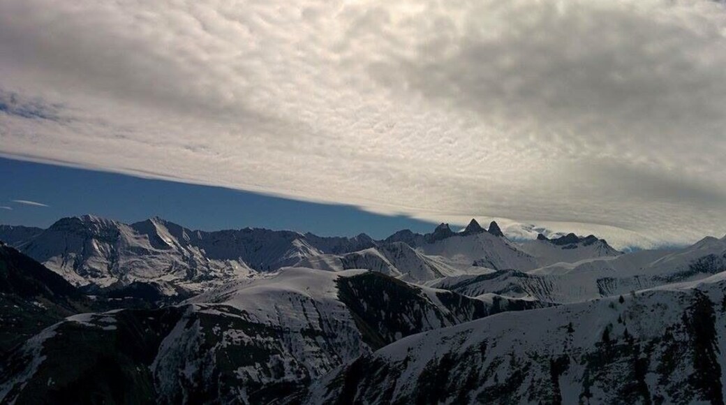 First time skiing in the French Alps. Nice weather and breathtaking views over the white sommets gives the experience an extra dimension.