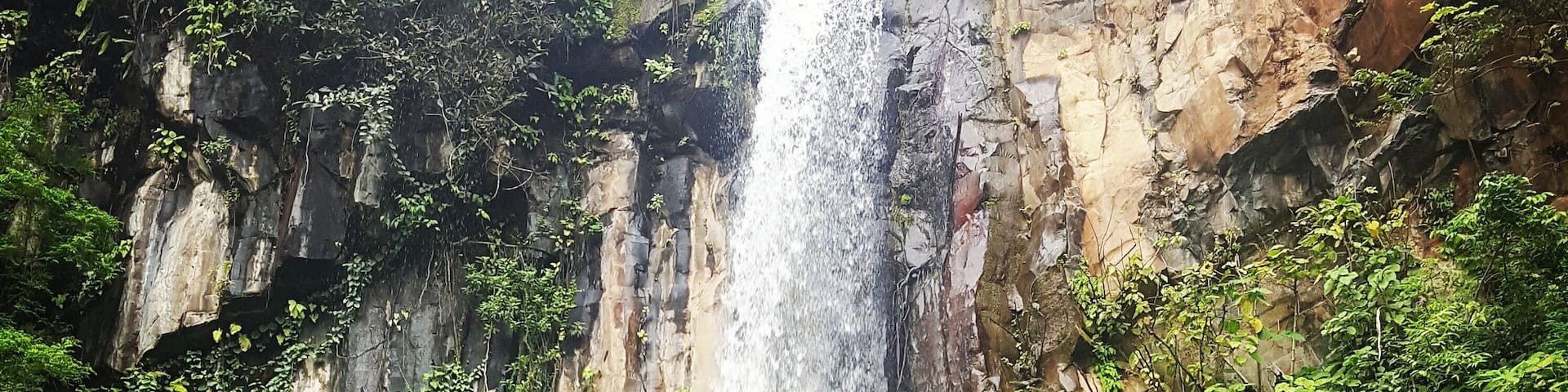 Beautiful waterfall on our hike to some natural thermal pools.