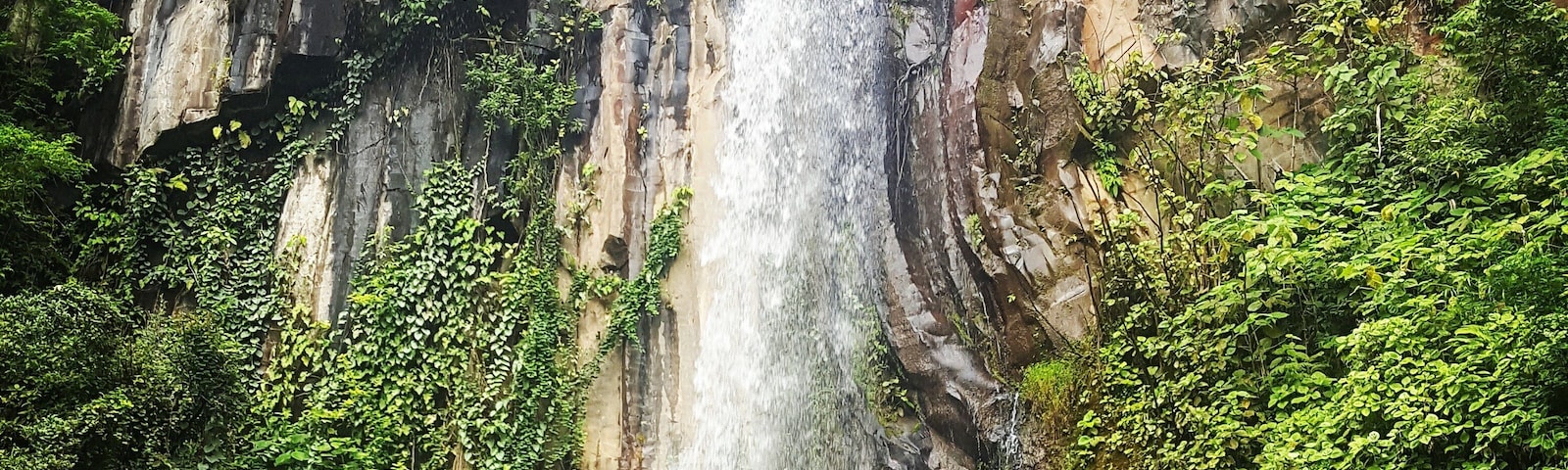 Beautiful waterfall on our hike to some natural thermal pools.