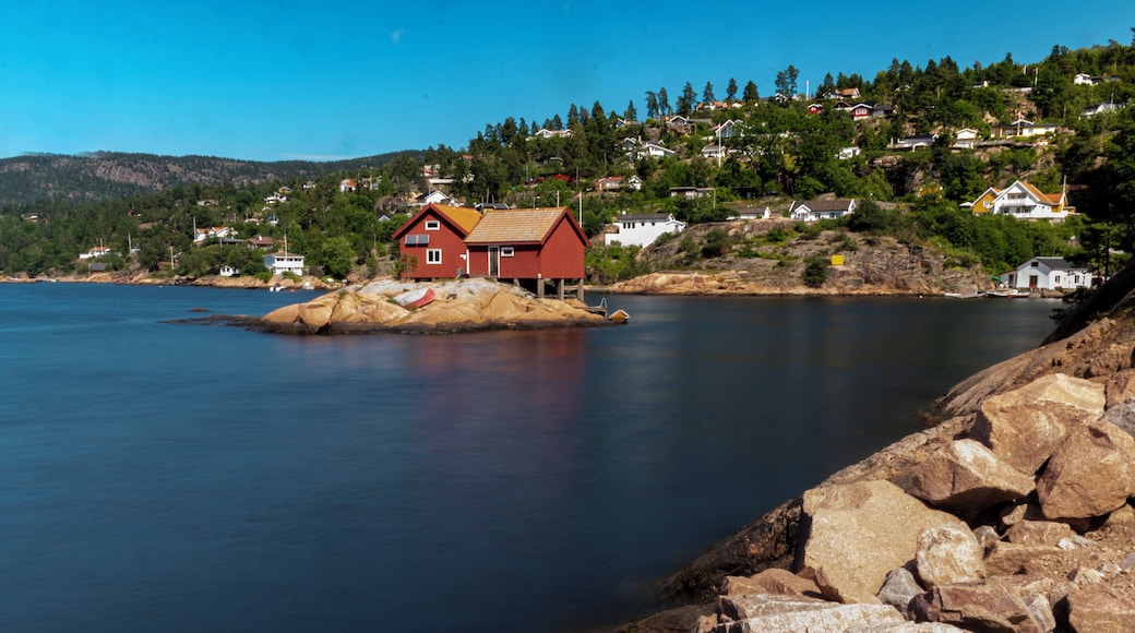 The Little Red House on a small island.