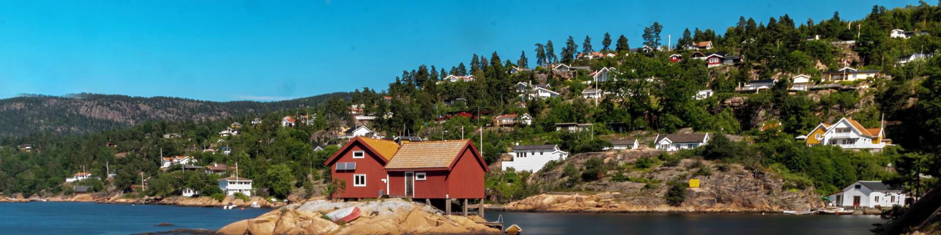 The Little Red House on a small island.