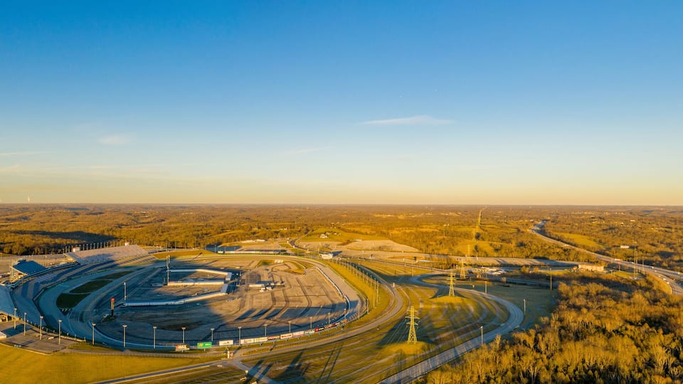 An aerial view of a large industrial complex with multiple buildings and roads.
