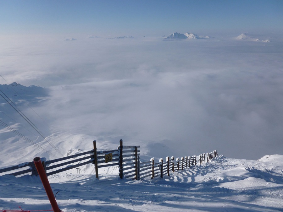 View from l'Aiguille Rouge of the cloudy valley below. Shot taken in the Arcs (Paradiski).