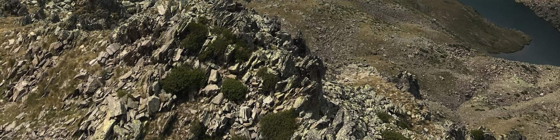 Above the clouds, amazing views. Thatâs France in the distance.