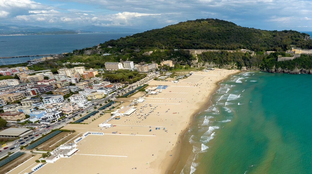 Aerial view of Serapo beach overlooking the Mediterranean Sea. It is the main beach of Gaeta, in the province of Latina, Lazio, Italy. In the background is the Monte Orlando regional park.