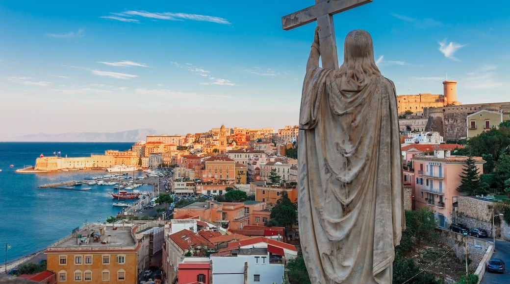 Panoramic sea landscape with Gaeta, Lazio, Italy. Scenic historical town with old buildings, ancient churches, nice sand beach and clear blue water. Famous tourist destination in Riviera de Ulisse