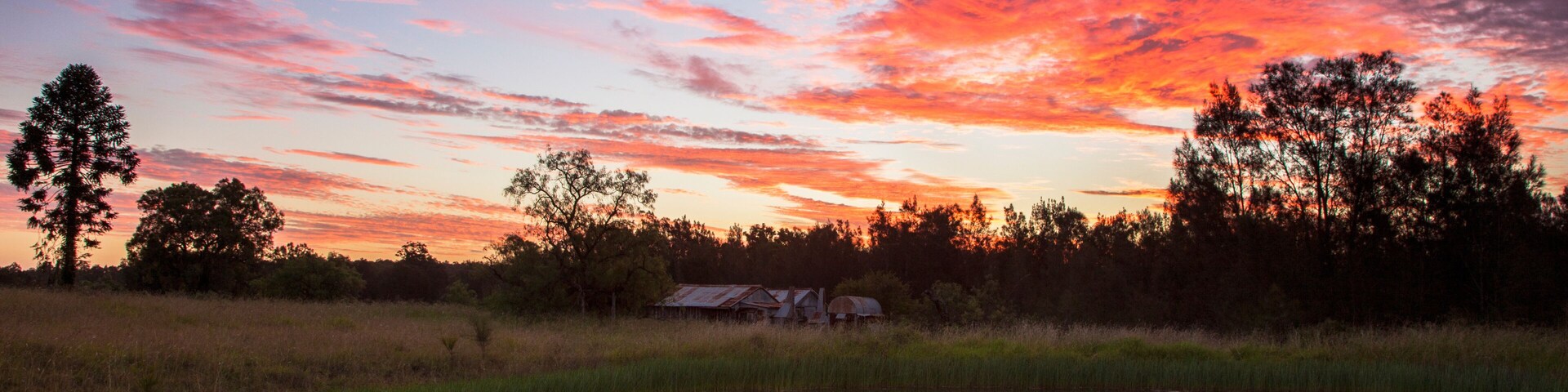 Beautiful sunset over Teds Hut and dam .Sedgefield near Singleton. Hunter Valley of N.S.W. Australia.