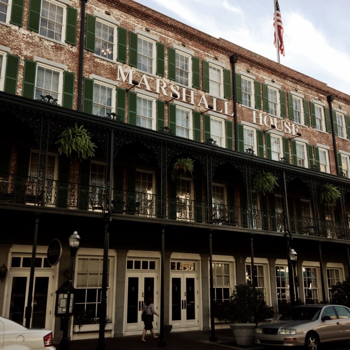 In 1851, businesswoman Mary Marshall, noting that Savannah was woefully in need of visitor accommodations, built the four-story Marshall House Hotel. It served as a hospital for soldiers during the Civil War. It was also home to Joel Chandler Harris, author of the famous Uncle Remus stories. By 1956, the hotel had closed and the first floor was used for businesses.  In 1999, $12 million was invested in its spectacular restoration.

Mary Leaver Marshall, the original proprietor of The Marshall House, was the daughter of Gabriel Leaver, a French cabinetmaker with a shrewd vision for developing Savannah's land.

The Hotel has its original staircases (some of the spindles and gingerbread have been recreated), original wood floors, fireplaces, brick walls, and the doors to each guest room are original as well. The Atrium was the courtyard and has been encased with a glass ceiling to give the sensation of what once was. The artifacts displayed on floors two and three were found during the renovation.