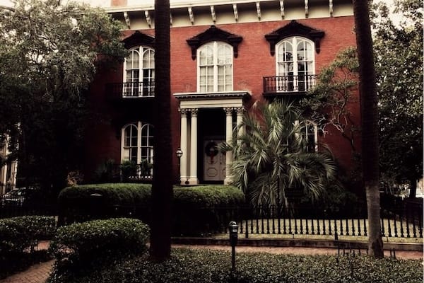 Designed by John S. Norris for General Hugh Weedon Mercer, construction of the house began in 1860. Construction was interrupted by the American Civil War, and finally completed around 1868 by the new owner, John Wilder.
Before Hansford's death, as retold in Midnight in the Garden of Good and Evil, the house had already been the scene of two deaths. In 1913, a previous owner tripped over the second floor banister, fractured his hip, and suffered a concussion, dying three days later. In 1964, a boy chasing pigeons on the roof fell over the edge and impaled himself on the iron fence below.