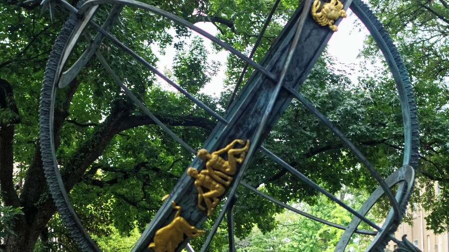 In the middle of the Troup Square is the g Armillary Sphere. Notice the sphere is held up by six tortoises. This Armillary Sphere statue was designed in 1968 with zodiac signs around the sphere and functions as a sundial. #LikeALocal, #Golden