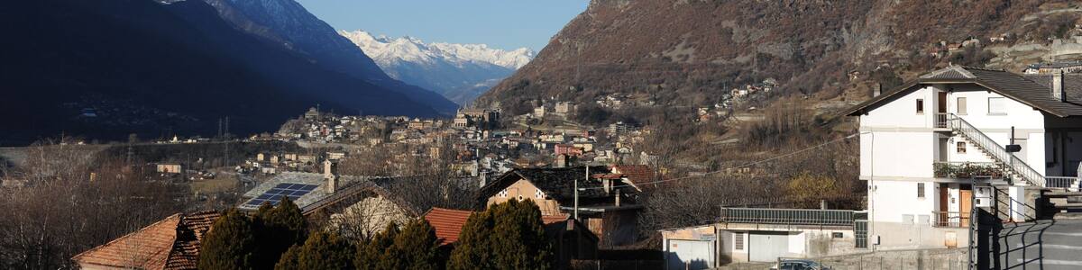 Panoramic view of Aosta valley (Valle d’Aosta) from Saint-Vincent in winter with Italian Alps in the background