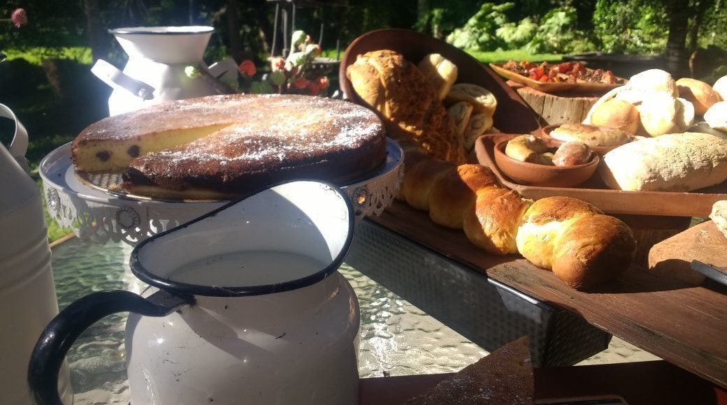 Center of Events and restaurant, located in the commune of Puyehue in the Region of Los Lagos, in the middle of a farm in southern Chile, surrounded by native and ornamental nature on the banks of the Moro River. "Family kitchen", specialty in German meats and pastries, served by its owners. It is a magical and natural place. Come and discover Turismo La Lecheria. A space to enjoy in the chilean patagonia.