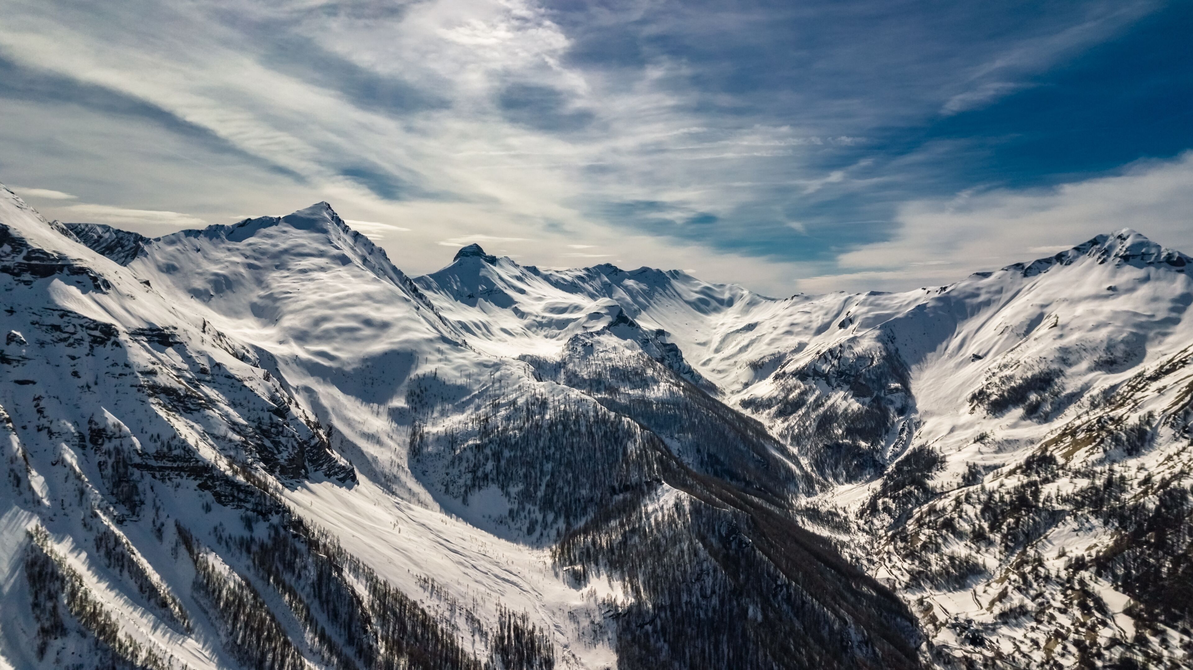 A panoramic drone view of the Alps 