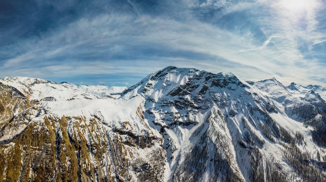 Panoramic drone view of the Alps with small village