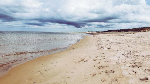 Jumping on over to Morelle, PEI where I spent a few days exploring the area, you can find beautiful sandy beaches nearby. What I found interesting is that the north end of PEI is mostly white sandy beaches, the south side are red sand beaches. In Morelle, the land is red but as soon as you hit the beach, it turns white with beautiful large and protected sand dunes. There are no short supply of beaches on PEI so you never feel crowded by people. The north end in this particular location was very little rocks so it's best for swimming and lounging on the beach. It's also the best spot to watch the most incredible sunset ever.