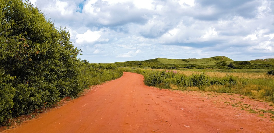 Jumping on over to Morelle, PEI where I spent a few days exploring the area, you can find beautiful sandy beaches nearby. What I found interesting is that the north end of PEI is mostly white sandy beaches, the south side are red sand beaches. In Morelle, the land is red but as soon as you hit the beach, it turns white with beautiful large and protected sand dunes. There are no short supply of beaches on PEI so you never feel crowded by people. The north end in this particular location was very little rocks so it's best for swimming and lounging on the beach. It's also the best spot to watch the most incredible sunset ever.