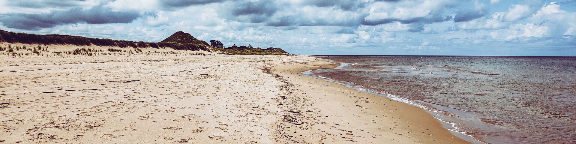 Jumping on over to Morelle, PEI where I spent a few days exploring the area, you can find beautiful sandy beaches nearby. What I found interesting is that the north end of PEI is mostly white sandy beaches, the south side are red sand beaches. In Morelle, the land is red but as soon as you hit the beach, it turns white with beautiful large and protected sand dunes. There are no short supply of beaches on PEI so you never feel crowded by people. The north end in this particular location was very little rocks so it's best for swimming and lounging on the beach. It's also the best spot to watch the most incredible sunset ever.