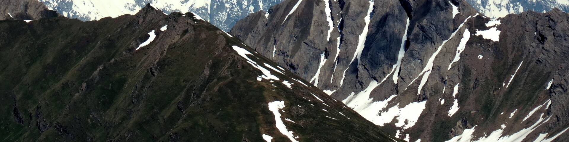The Grandes Jorasses mountain chain with Dente Gigante (a giant tooth) 4105 m left and right Point Walker 4208 m