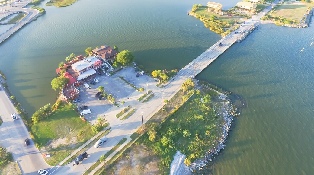Aerial view of Seabrook city near Texas Gulf Coast and Clear Lake. Waterfront harbor town with pier. Wooden vacation house under construction. Real estate and beach travel background